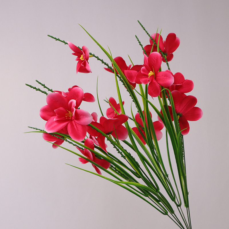 Simulated flower freesia   garden landscaping to create floral styling Fuchsia